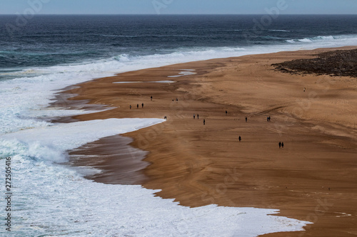 beah in nazare portugal photo