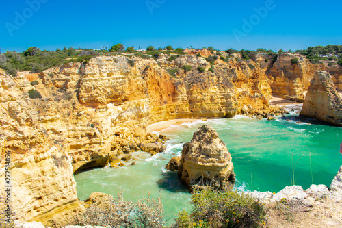 Praia de Marinha most Iconic Beach and Popular Landmark in Lagoa, Algarve Portuga. Beautiful landscape on coast of Atlantic Ocean 