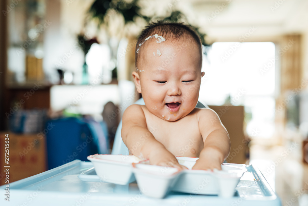 Adorable kid eating at home Adorable kid eating at home