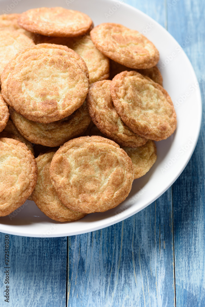 Plate full of homemade snickerdoodle cookies Plate full of homemade snickerdoodle cookies