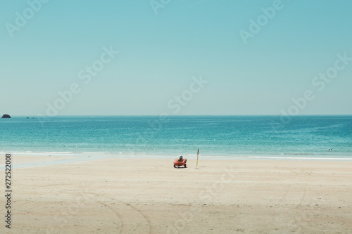 Golden sandy beach filtered with copy space.