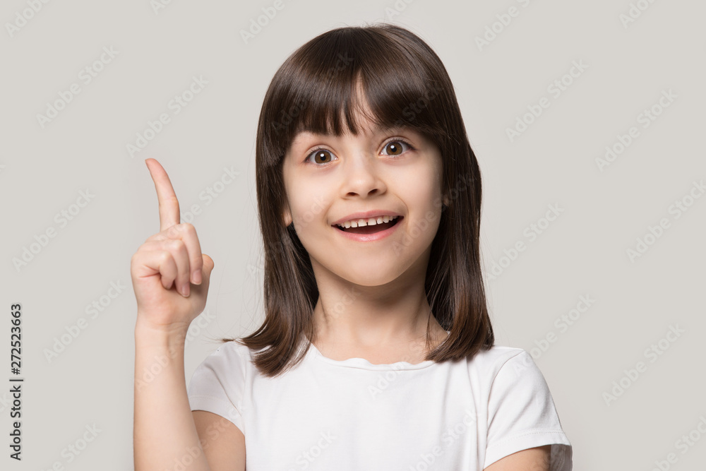 Little girl raises finger came up with an idea Little girl raises finger came up with an idea