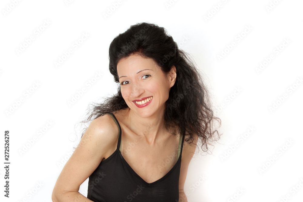 Disheveled curly attractive young woman smiling portrait on white background Disheveled curly attractive young woman smiling portrait on white background