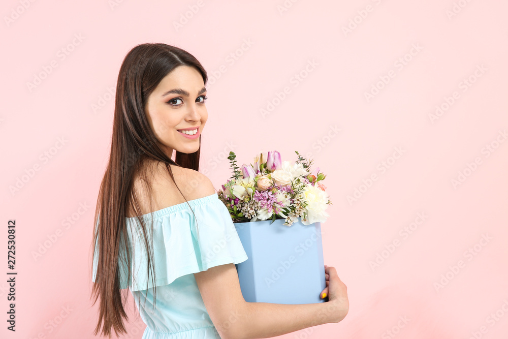 Beautiful young woman with bouquet of flowers on color background Beautiful young woman with bouquet of flowers on color background