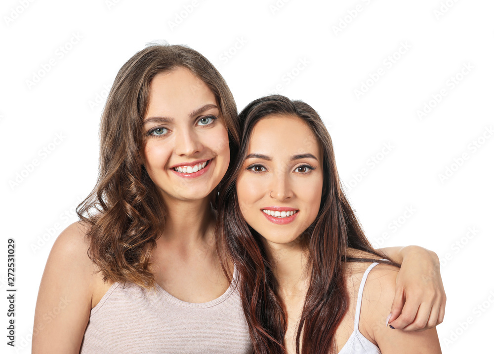Portrait of happy lesbian couple on white background Portrait of happy lesbian couple on white background