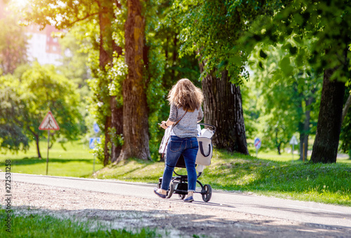 Wallpaper Mural Mother wheeling a pram in the Park Torontodigital.ca