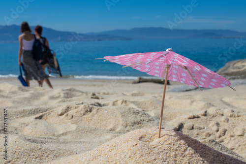 parasol in the sand of the beach, summer and holidays © carballo