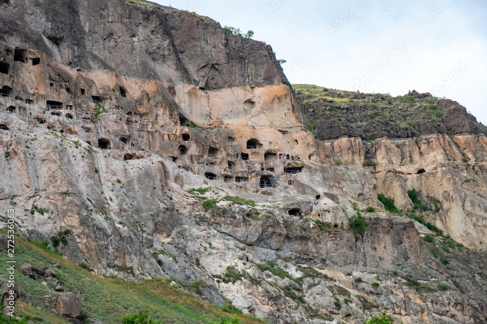 View of Vardzia caves. Vardzia is a cave monastery site in southern Georgia, excavated from the slopes of the Erusheti Mountain on the left bank of the Kura River View of Vardzia caves. Vardzia is a cave monastery site in southern Georgia, excavated from the slopes of the Erusheti Mountain on the left bank of the Kura River