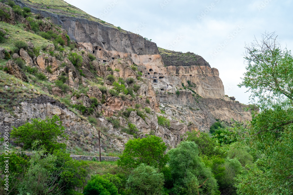 View of Vardzia caves. Vardzia is a cave monastery site in southern Georgia, excavated from the slopes of the Erusheti Mountain on the left bank of the Kura River View of Vardzia caves. Vardzia is a cave monastery site in southern Georgia, excavated from the slopes of the Erusheti Mountain on the left bank of the Kura River
