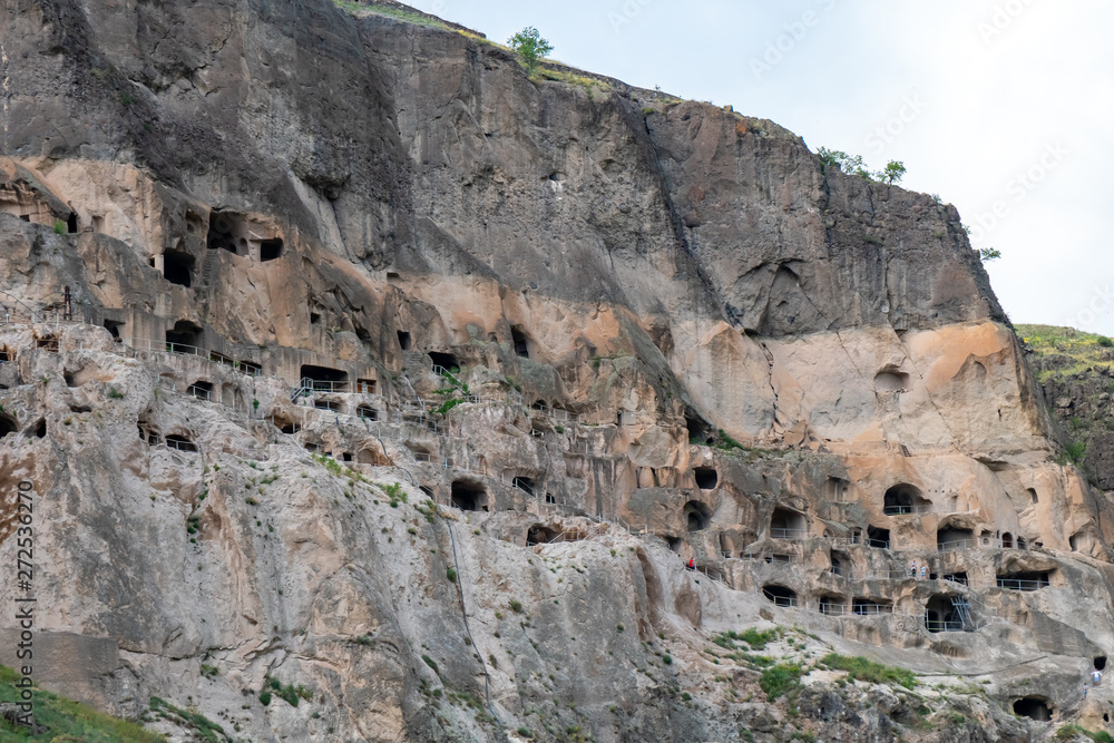 View of Vardzia caves. Vardzia is a cave monastery site in southern Georgia, excavated from the slopes of the Erusheti Mountain on the left bank of the Kura River View of Vardzia caves. Vardzia is a cave monastery site in southern Georgia, excavated from the slopes of the Erusheti Mountain on the left bank of the Kura River