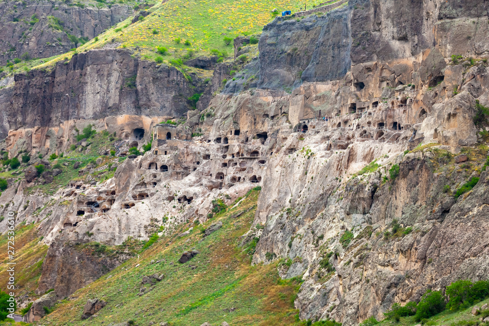 View of Vardzia caves. Vardzia is a cave monastery site in southern Georgia, excavated from the slopes of the Erusheti Mountain on the left bank of the Kura River View of Vardzia caves. Vardzia is a cave monastery site in southern Georgia, excavated from the slopes of the Erusheti Mountain on the left bank of the Kura River