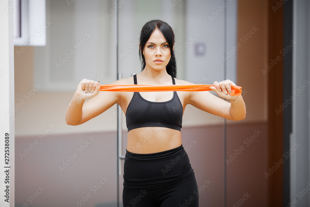Healthy lifestyle. Fitness woman doing exercise in gym