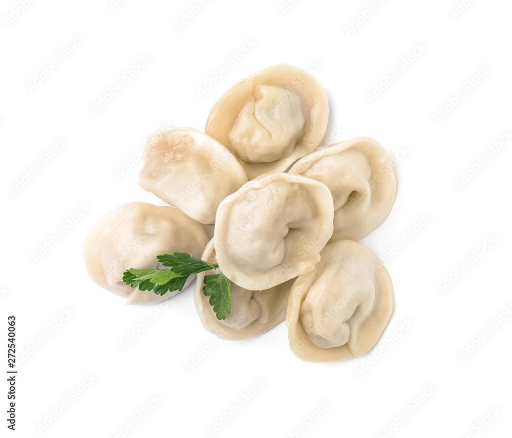 Pile of boiled dumplings with parsley leaves on white background, top view Pile of boiled dumplings with parsley leaves on white background, top view