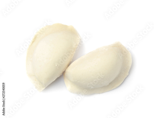 Raw dumplings on white background, top view