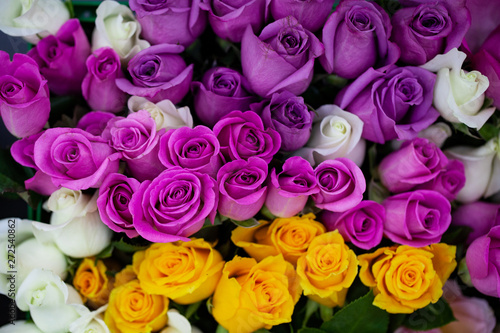 Close up view of beautiful flowers mix in the box. Unpacking and deliver flowers. Small business.