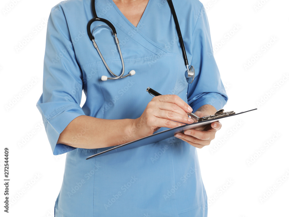 Closeup of female doctor in scrubs with clipboard isolated on white. Medical staff Closeup of female doctor in scrubs with clipboard isolated on white. Medical staff