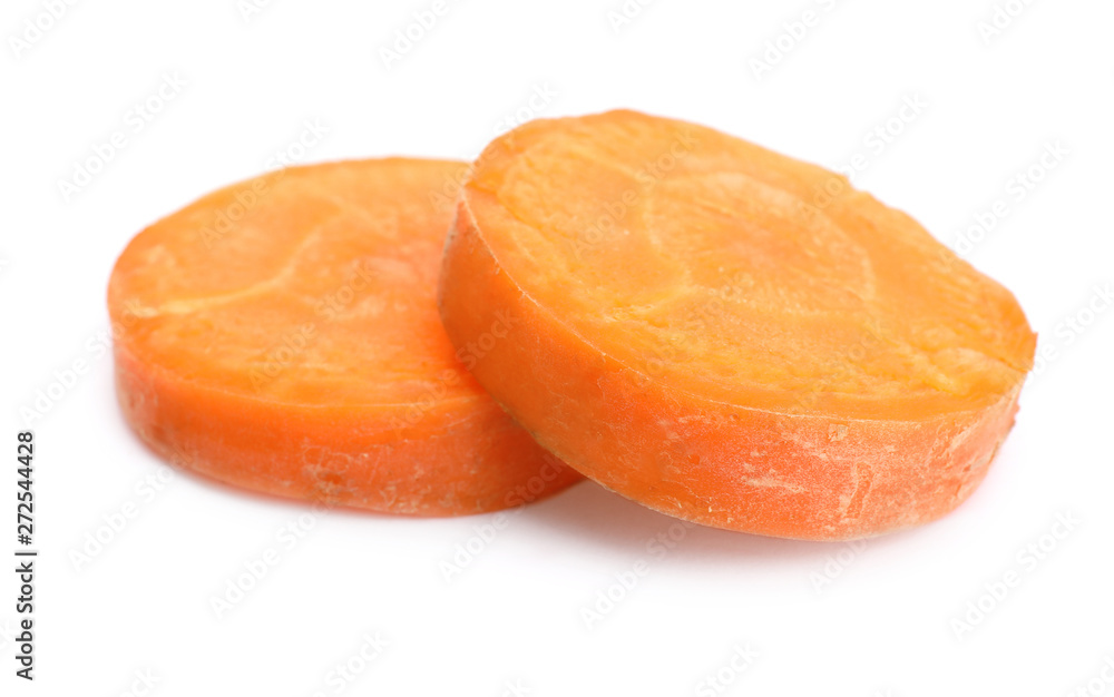 Slices of fresh ripe carrot on white background Slices of fresh ripe carrot on white background