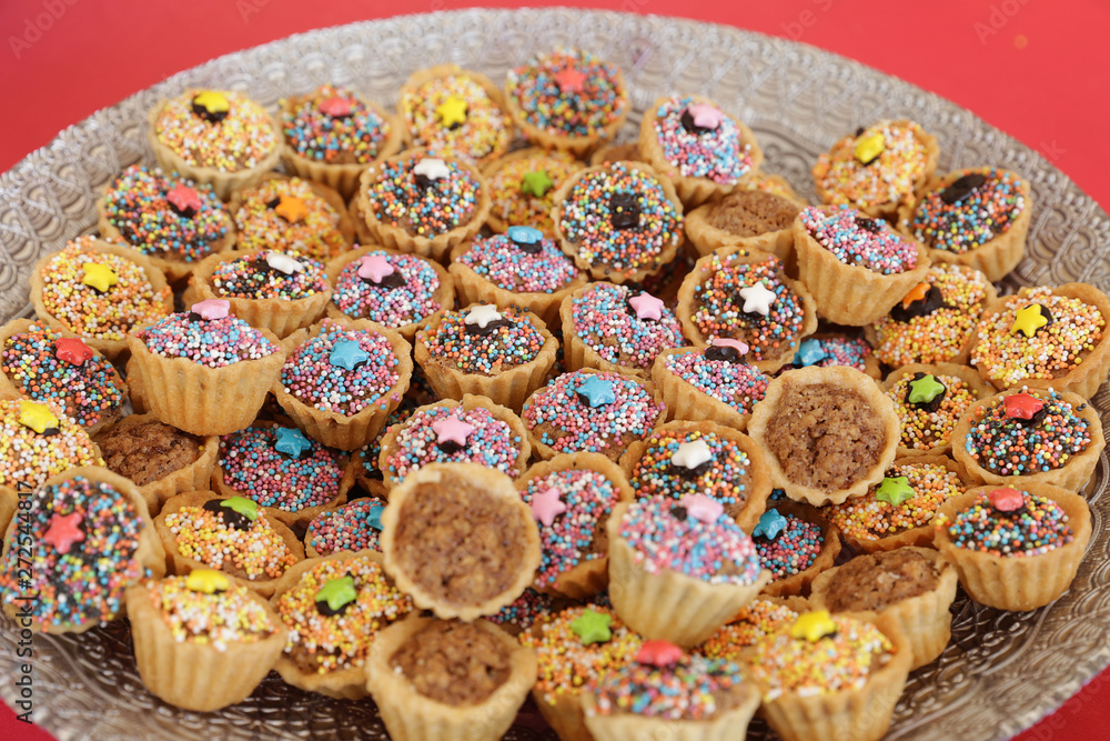 Mixed Christmas cookies, Colorful mix of Christmas-themed decorated cookies Mixed Christmas cookies, Colorful mix of Christmas-themed decorated cookies