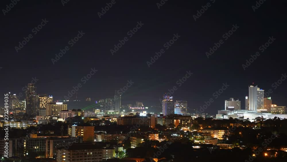 Static timelapse of the famous city Pattaya in Thailand with green laser beams in the sky. Static timelapse of the famous city Pattaya in Thailand with green laser beams in the sky.