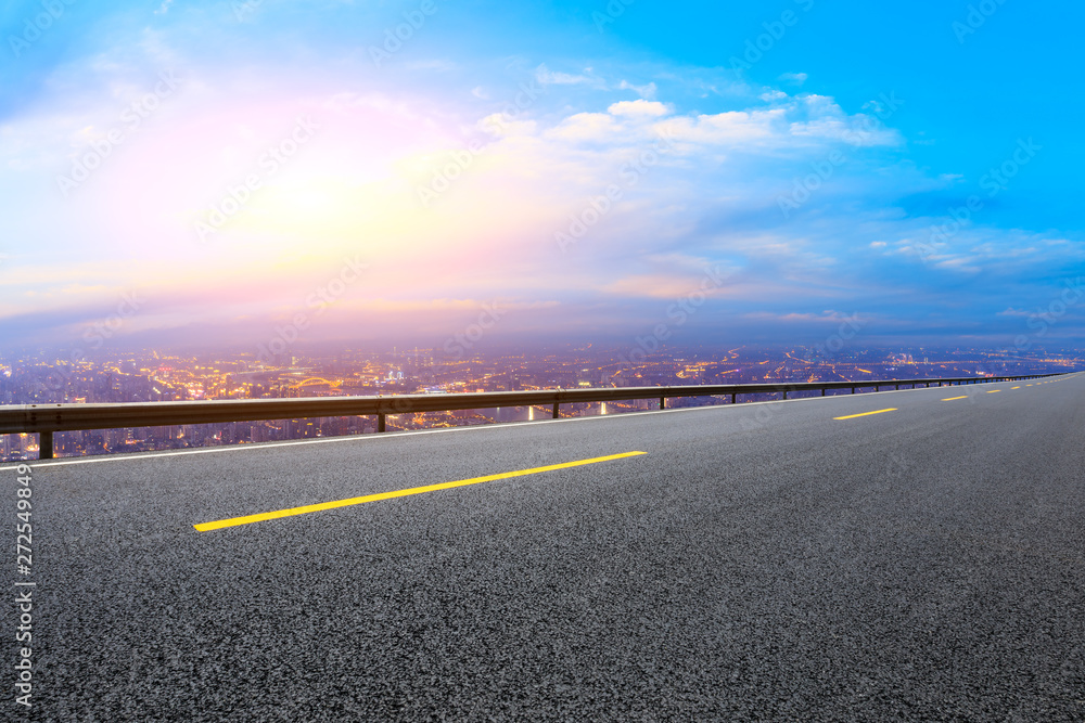 Fototapeta premium Empty highway road and modern city skyline in Shanghai,China