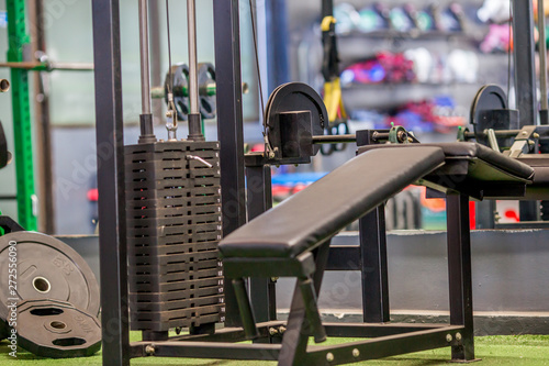 The background of the exercise equipment set for good health (steel balls, dumbbells, cable, weightlifting, boxing boxing gloves, fitness balls) has a blurred light that Fall 