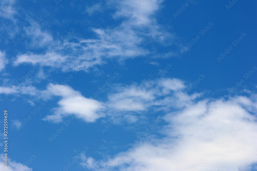 Fototapeta premium blue sky background and white clouds soft focus