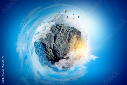 Mountain peak on a blue bright background photo