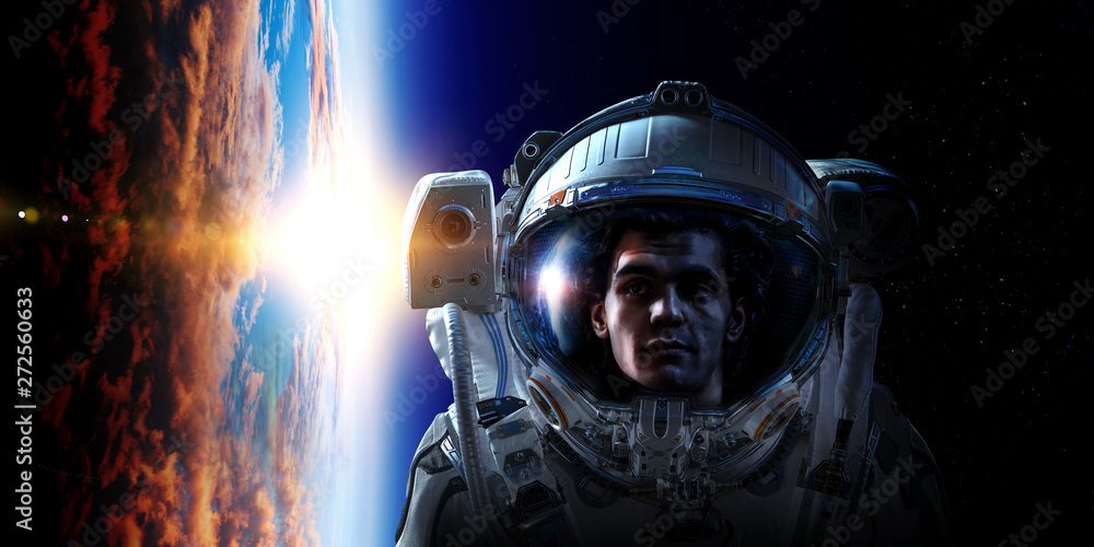Fototapeta premium Spaceman and planet, human in space concept