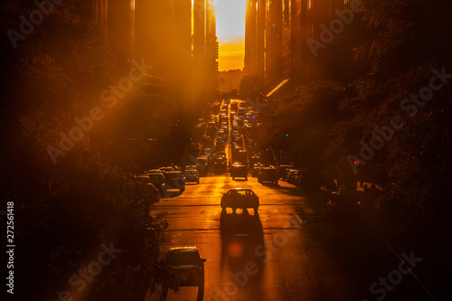 Sunset over 42nd Street with the colorful lights of traffic through Midtown Manhattan, New York City NYC photo