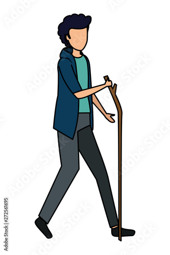 happy young man walking with wood stick