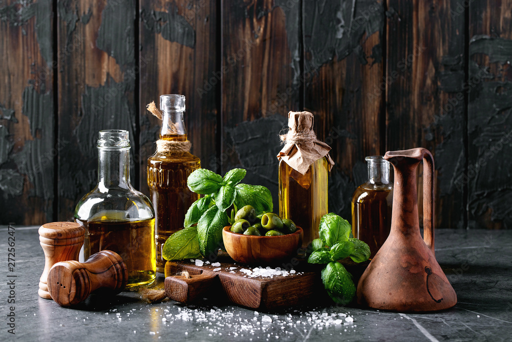 Naklejka Olive oil in glass bottles