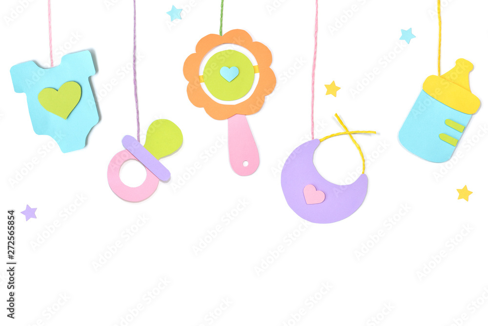 Baby toys hanging paper cut on white background - isolated Baby toys hanging paper cut on white background - isolated