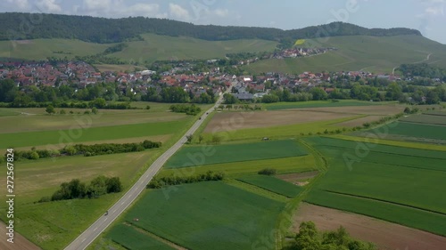 Aerial of Hohenhaslach, Germany.  CAmera zooms in slowly over fields toward the village of Hohenhaslach.  photo