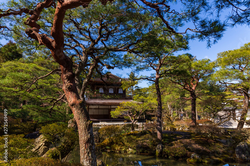 Silver Pavilion through the trees of a zen garden in Ginkakuji temple in Kyoto, Japan. photo