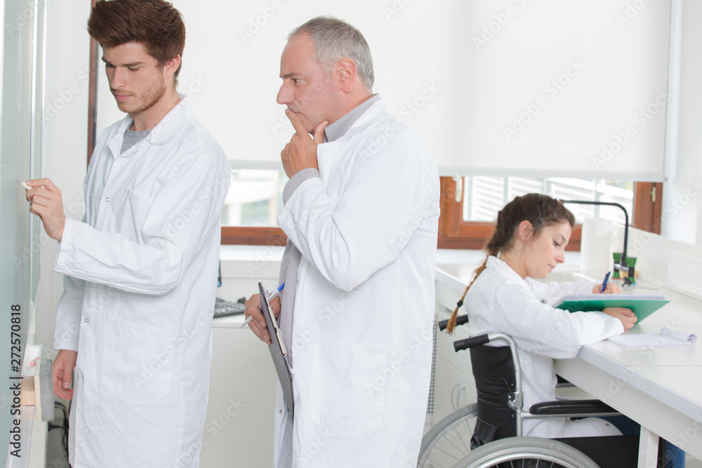 Fototapeta premium student working formula with teacher