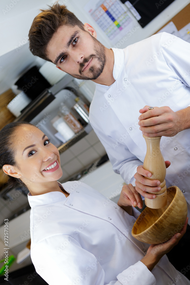 chef and sous chef posing chef and sous chef posing