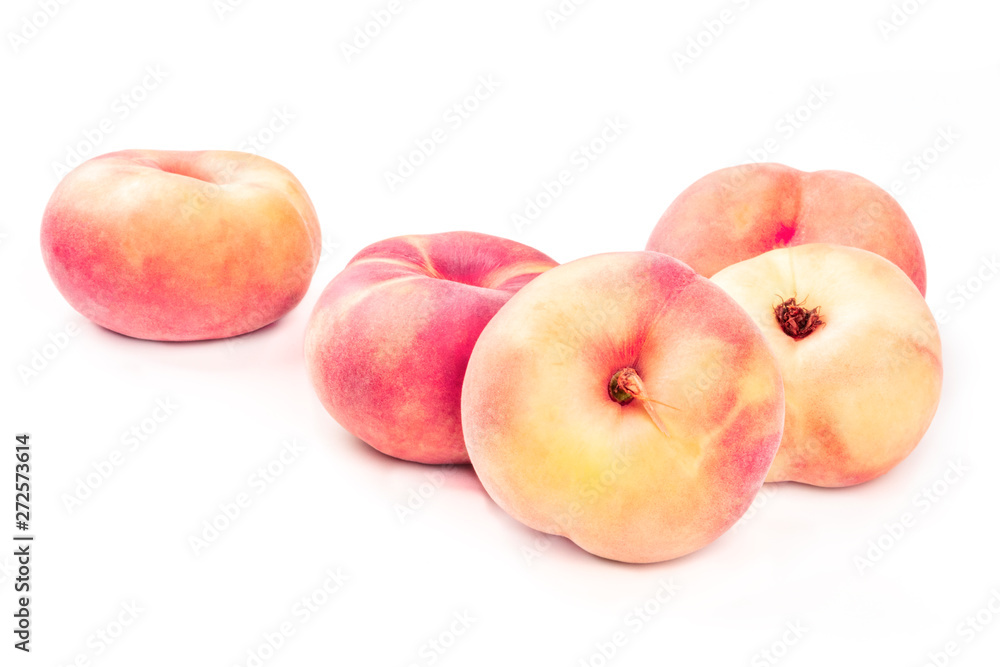 Vibrant organic flat saturn peaches on a white background with a place for text Vibrant organic flat saturn peaches on a white background with a place for text