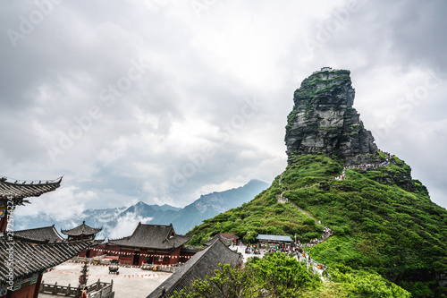 Chengen buddhist temple and view of the new golden summit in Fanjing mountain Guizhou China photo