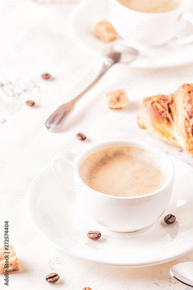 Traditional breakfast with fresh croissants on white background. Traditional breakfast with fresh croissants on white background.