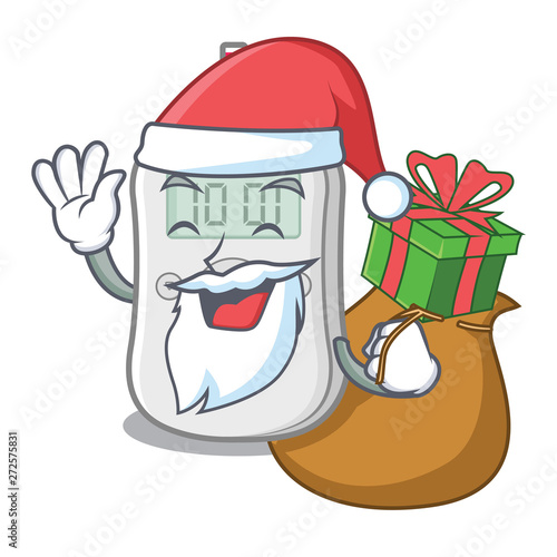 Santa with gift diabetes check machine above mascot table