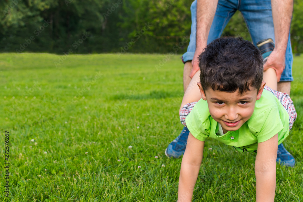 dad and son have a good time in the Park dad and son have a good time in the Park