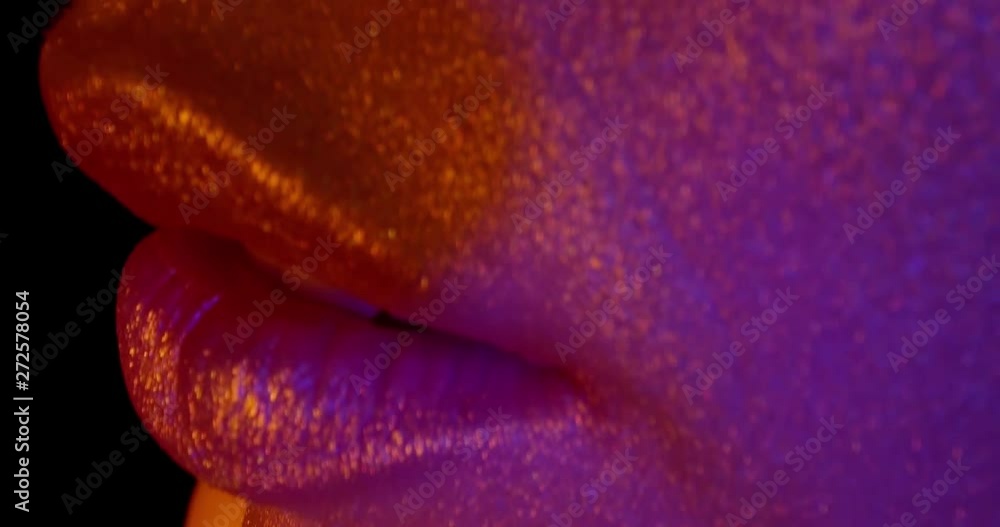View Of Girl's Face Part With Beautiful Golden Face. Art Lipstick, Lips. Teeth. 4K. Macro. View Of Girl's Face Part With Beautiful Golden Face. Art Lipstick, Lips. Teeth. 4K. Macro.