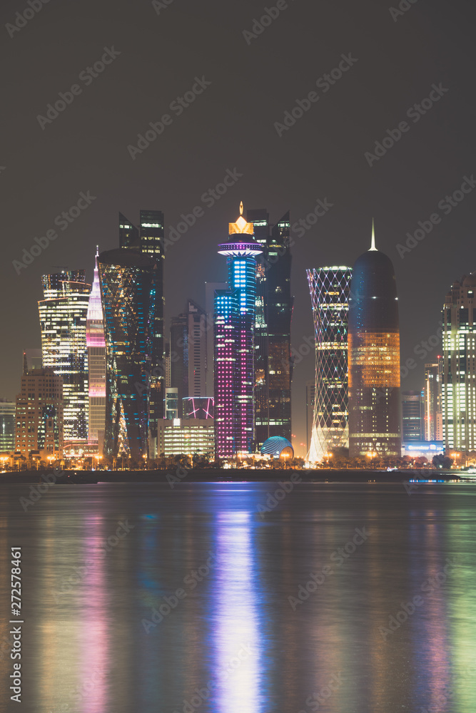 Fototapeta premium Doha skyline by night, in Qatar