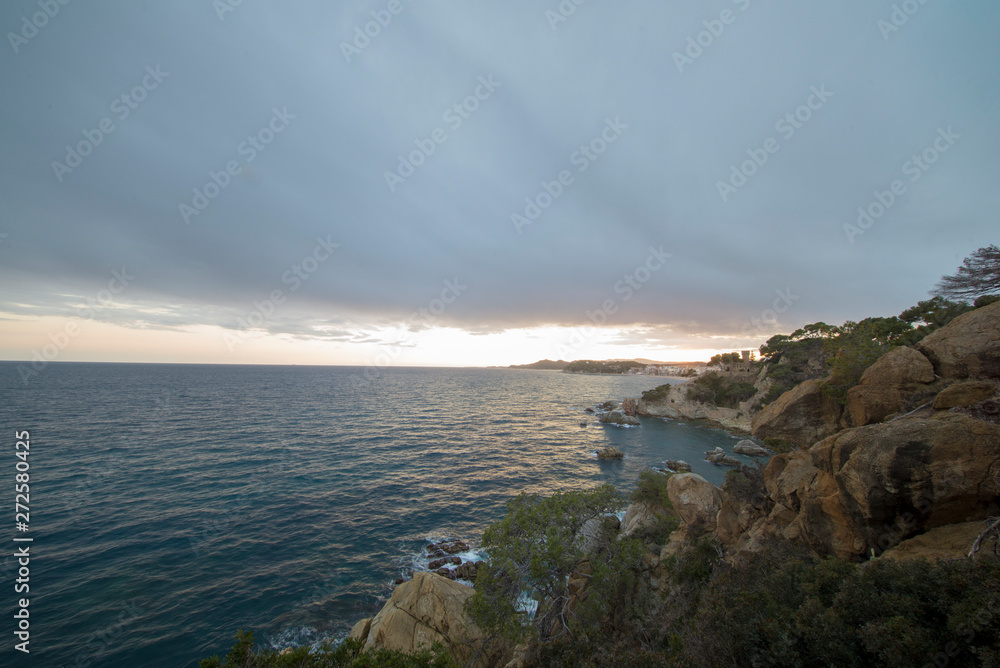Naklejka premium Sunset on the Ronda de Lloret de Mar path