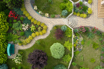 Acrylglasbilder Pistache Garden with walkways and green grass. Photo taken from above drone.  © vfhnb12