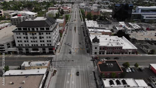 Beautiful Utah County Sunny Orem Downtown Provo Summer Wasatch Range Uinta Mountains Background Buildings Temple BYU Campus College USA 4K Street view cars driving bus lane from uta transportation