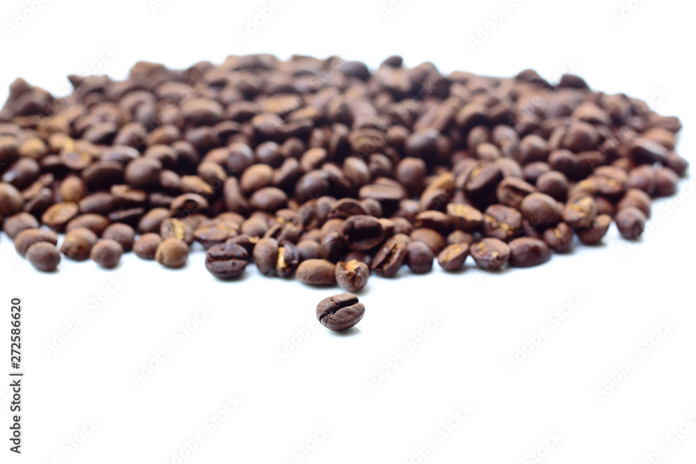 Roasted coffee bean on white surface Roasted coffee bean on white surface