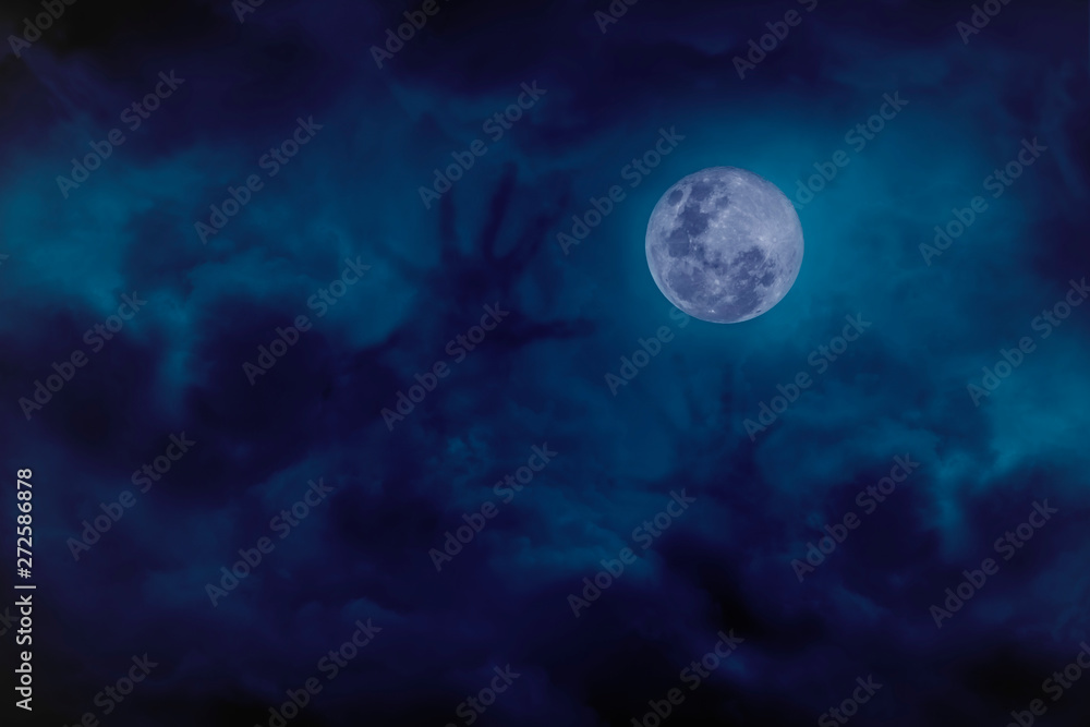Blue full moon with cloud demon on blue darkness sky, concept of horror Blue full moon with cloud demon on blue darkness sky, concept of horror