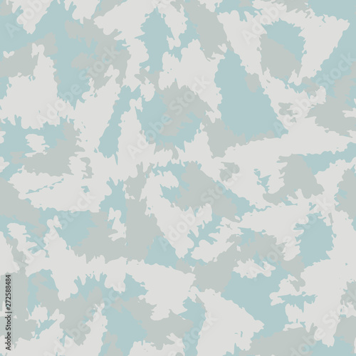 Winter camouflage of various shades of grey, blue and white colors