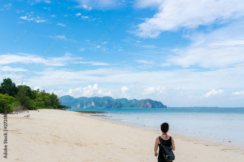 Young girl on Beautiful Tropical Beach PP Island, Krabi, Phuket, Thailand blue ocean background Woman items vacation accessories for holiday or long weekend a guide choice idea for planning travel Young girl on Beautiful Tropical Beach PP Island, Krabi, Phuket, Thailand blue ocean background Woman items vacation accessories for holiday or long weekend a guide choice idea for planning travel